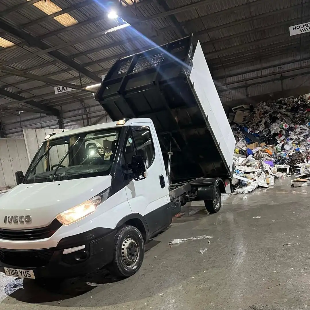 The Keep It Green tipper tipping a load of cleared garden waste at a licensed transfer station